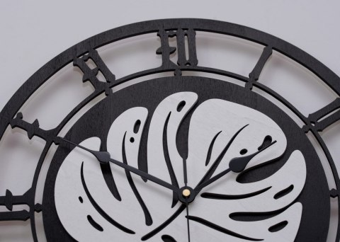 Czarny zegar z motywem monstery